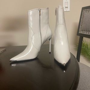 Steve Madden and Winnie Harlow leather booties.